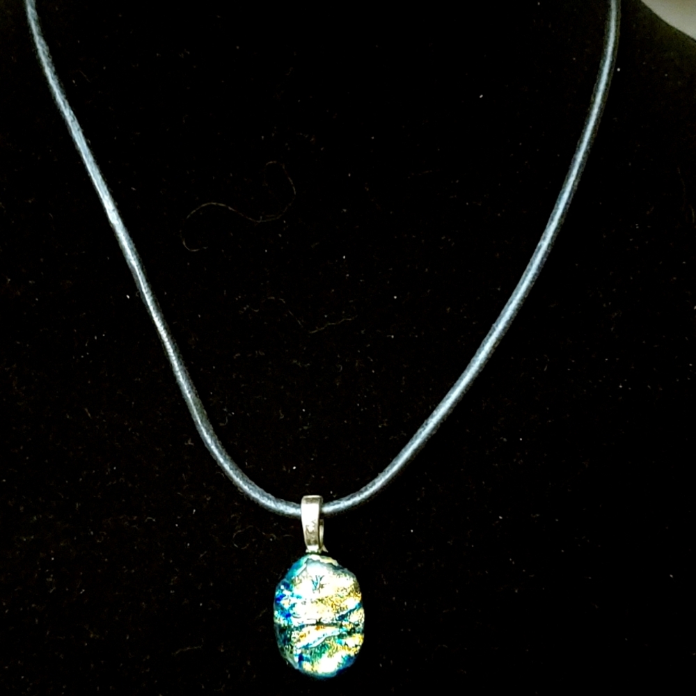 Opal Pendant on leather chain.